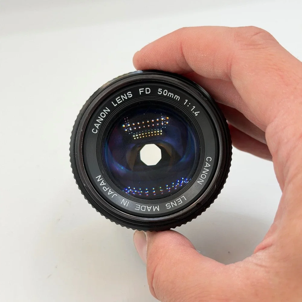 Canon A-1 35mm Film SLR Camera with FD 50mm f/1.4 Lens 1980 Olympics Cap Black